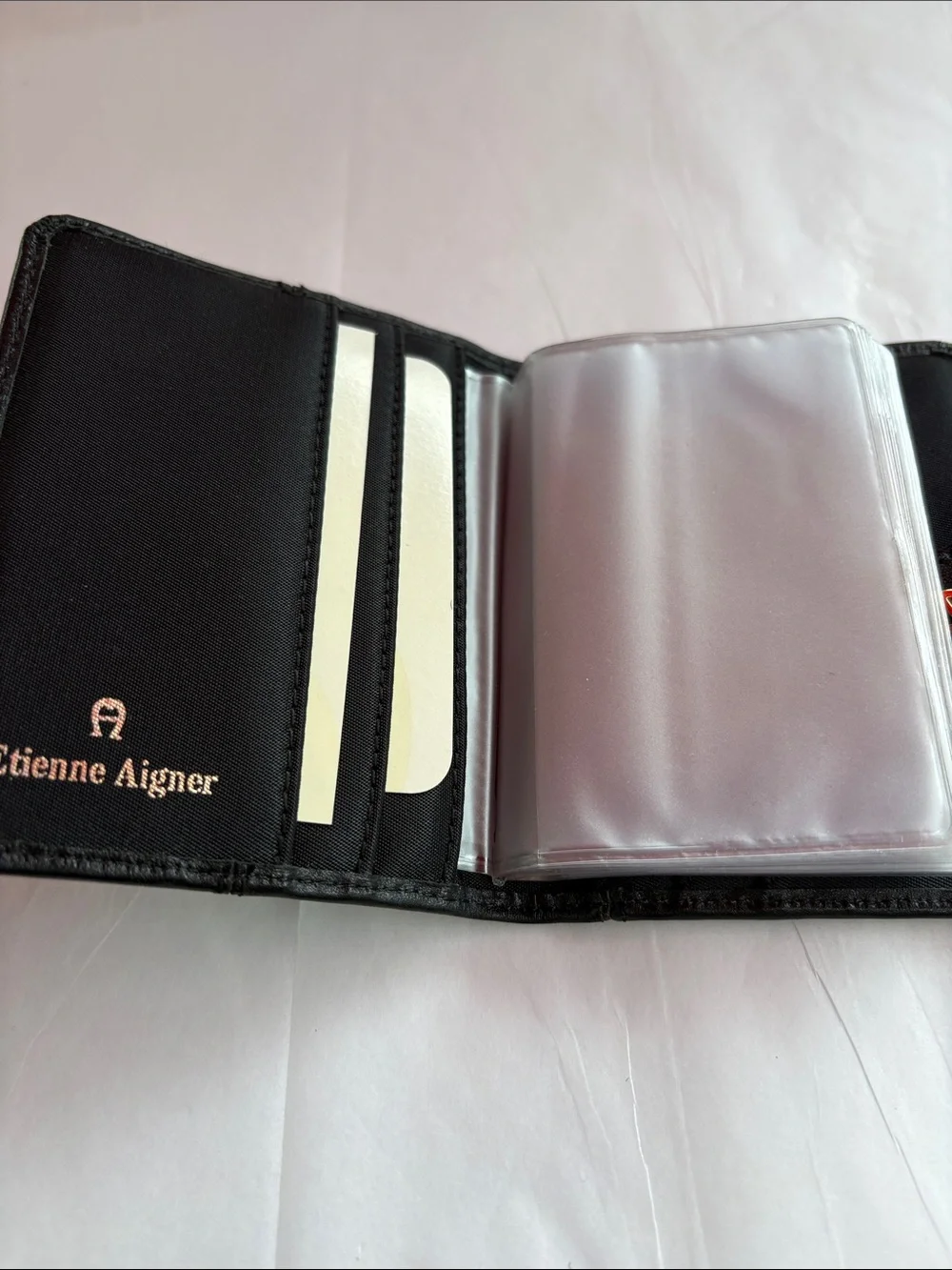 Compact Black Leather Women's Wallet with Snap Tab Etienne Aigner.